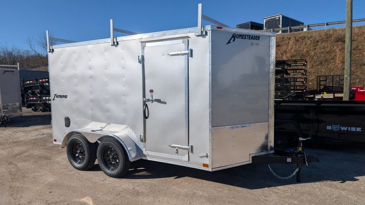 New 2027 Homesteader 7x12 Tandem Intrepid V-Nose Contractor Trailer w/ Barn Doors & Ladder Rack