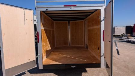 New 2027 Homesteader 7x12 Tandem Intrepid V-Nose Contractor Trailer w/ Barn Doors & Ladder Rack