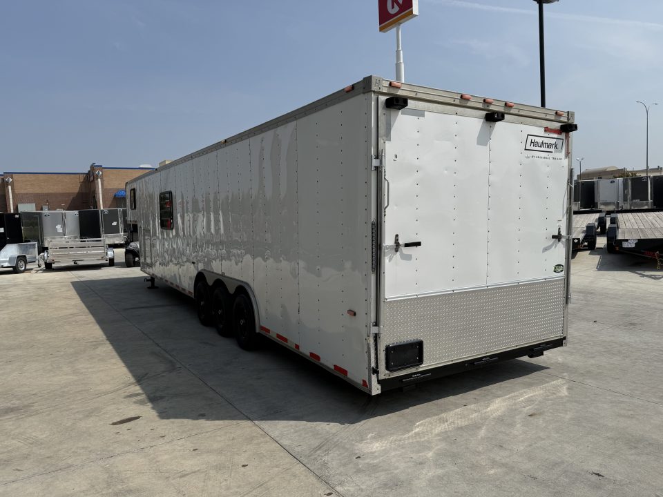Used 2006 Haulmark 8.5x34 enclosed 3-5200lb axles=15K 7 ft tall Cargo car hauler gooseneck Rear Ramp Trailer