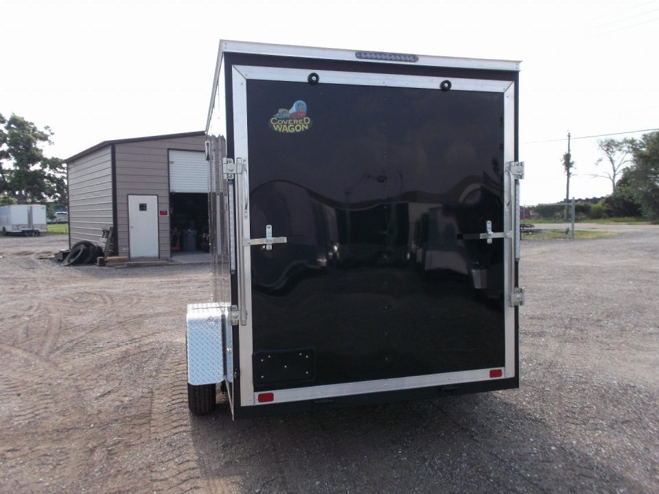 New 2027 Covered Wagon Trailers 6x10 Cargo / Enclosed Trailer / 6'6" Interior Height / Extra Wide Ramp Gate / RV Side Door /.030 Black Semi-Screwless Exterior