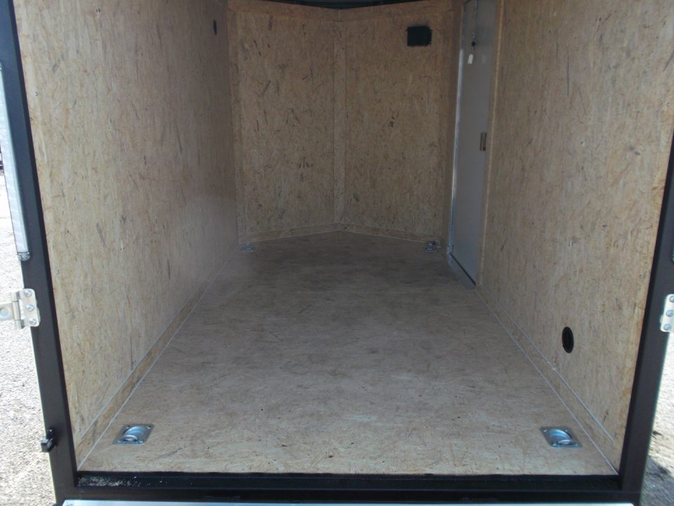 New 2027 Covered Wagon Trailers 6x10 Cargo / Enclosed Trailer / 6'6" Interior Height / Extra Wide Ramp Gate / RV Side Door /.030 Black Semi-Screwless Exterior