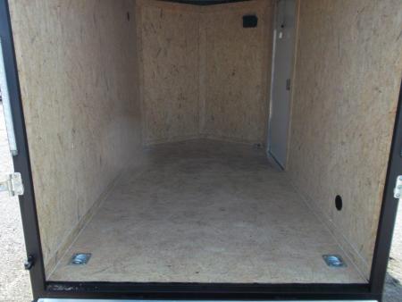 New 2027 Covered Wagon Trailers 6x10 Cargo / Enclosed Trailer / 6'6" Interior Height / Extra Wide Ramp Gate / RV Side Door /.030 Black Semi-Screwless Exterior