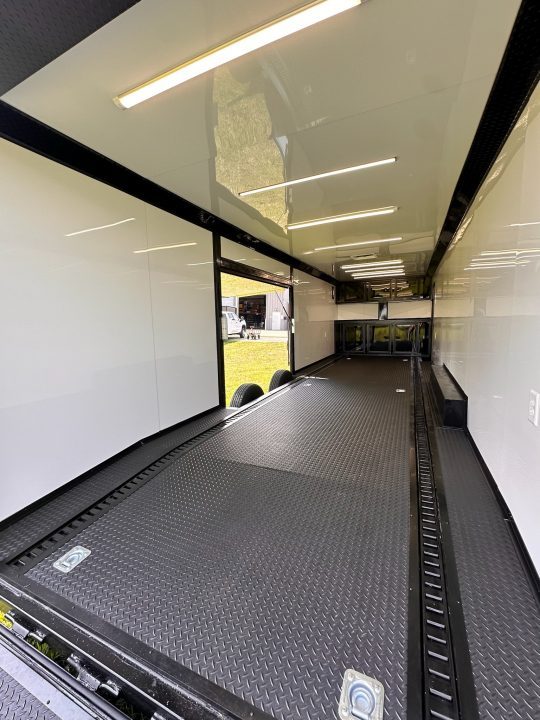 New 2026 Luxe 8.5x28 Race Trailer - Finished Interior- 7000lb Spread Torsion - Recessed E-Track-Full Escape Door-Removable Fender