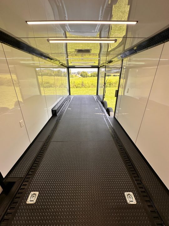 New 2026 Luxe 8.5x28 Race Trailer - Finished Interior- 7000lb Spread Torsion - Recessed E-Track-Full Escape Door-Removable Fender