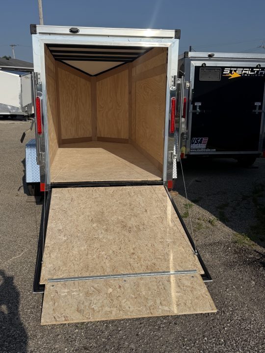 New 2026 5 x 10 Enclosed Stealth Trailer with Ramp - SCREWLESS - LIGHT LID ROOFING