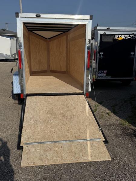 New 2026 5 x 10 Enclosed Stealth Trailer with Ramp - SCREWLESS - LIGHT LID ROOFING
