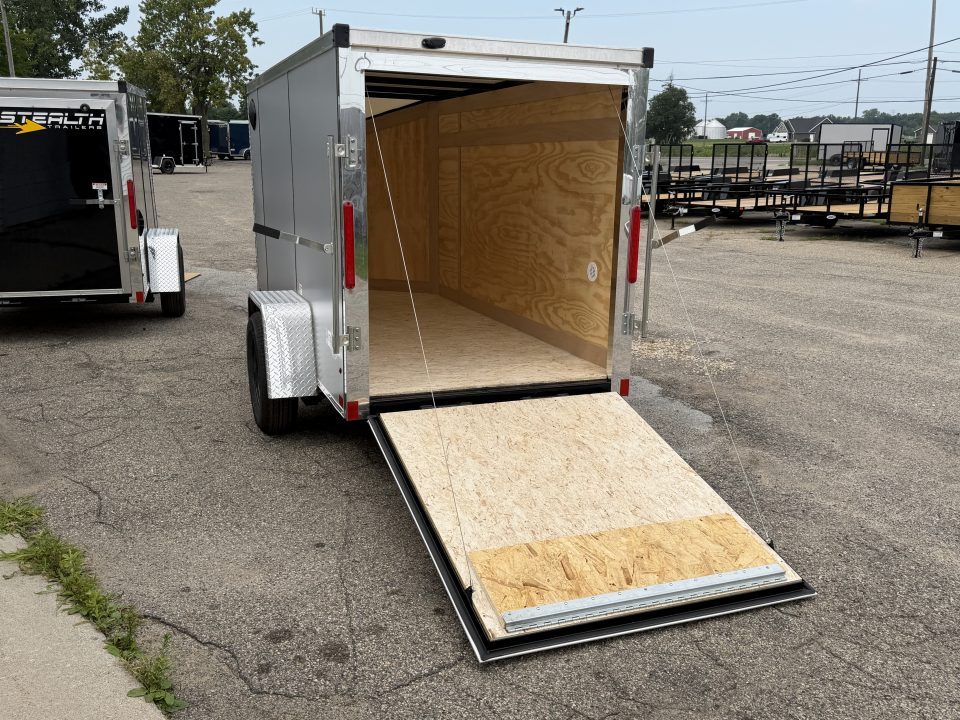 New 2026 5 x 10 Enclosed Stealth Trailer with Ramp - SCREWLESS - LIGHT LID ROOFING
