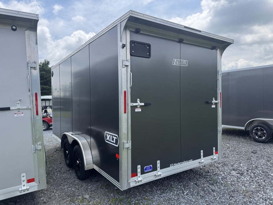 New 2027 E-Z Hauler EZEC7.5X16 XLT-P Cargo / Enclosed Trailer 71 SERIES 7 FOOT 1 INCH INTERIOR HEIGHT .080 POLY CORE SIDES TRANSLUCENT ROOF REAR CANOPY FREE ALUMINUM WHEEL UPGRADE