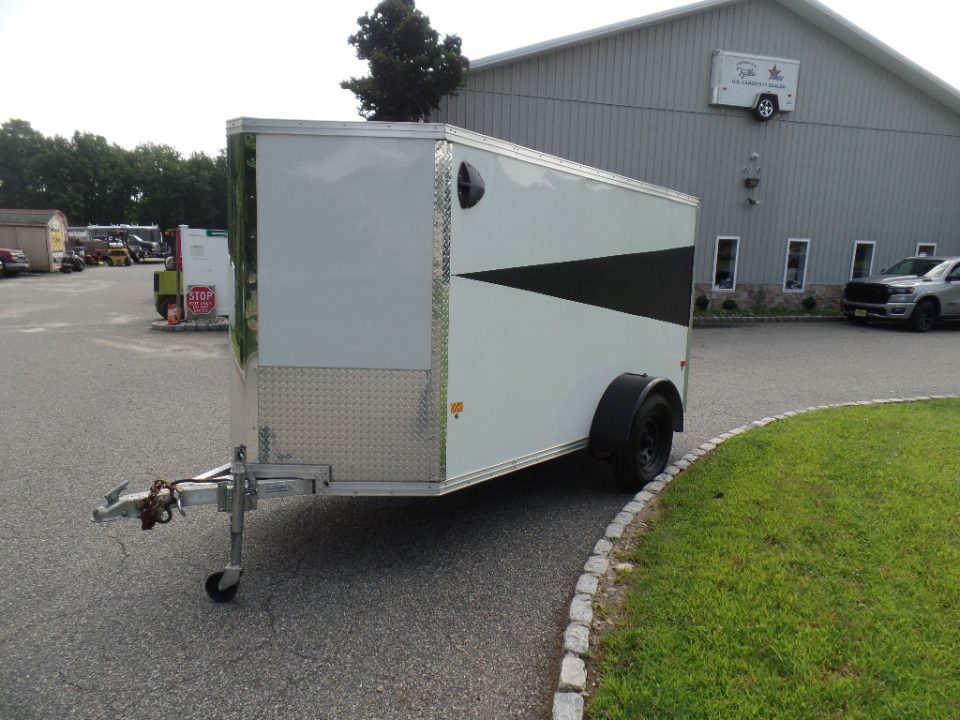 Used 2025 ALCOM 5' by 10 ft. , with 2,990 lb. GVWR, 67" interior height Cargo / Enclosed Trailer