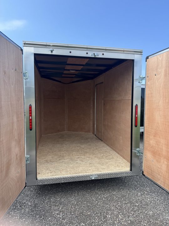New 2026 6x10 + V-Nose Enclosed Cargo Trailer, rear barn doors