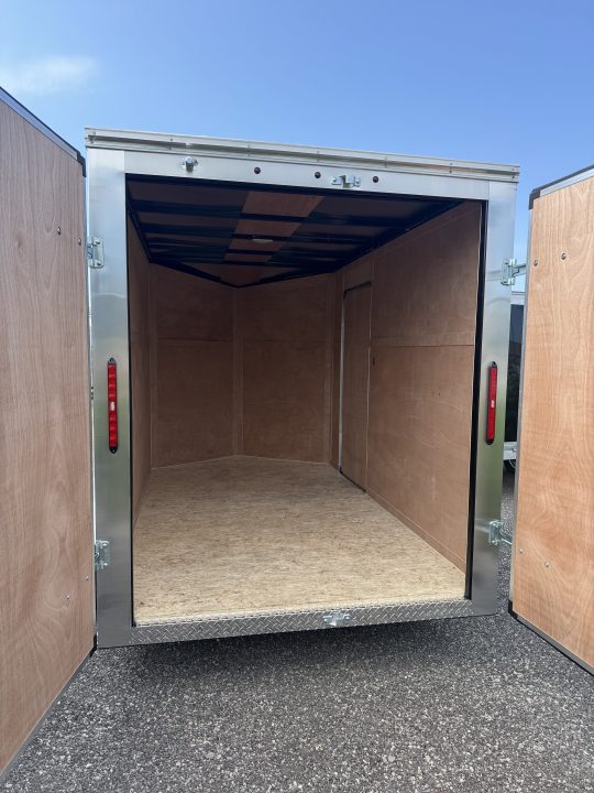 New 2026 6x10 + V-Nose Enclosed Cargo Trailer, rear barn doors