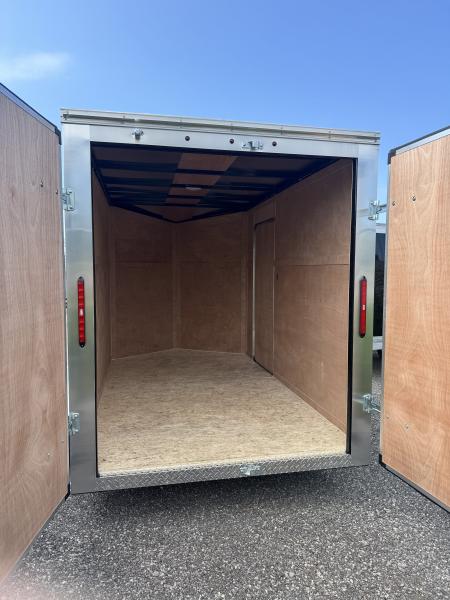New 2026 6x10 + V-Nose Enclosed Cargo Trailer, rear barn doors