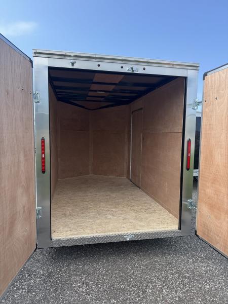 New 2026 6x10 + V-Nose Enclosed Cargo Trailer, rear barn doors