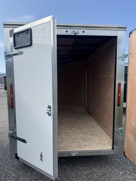 New 2026 6x10 + V-Nose Enclosed Cargo Trailer, rear barn doors