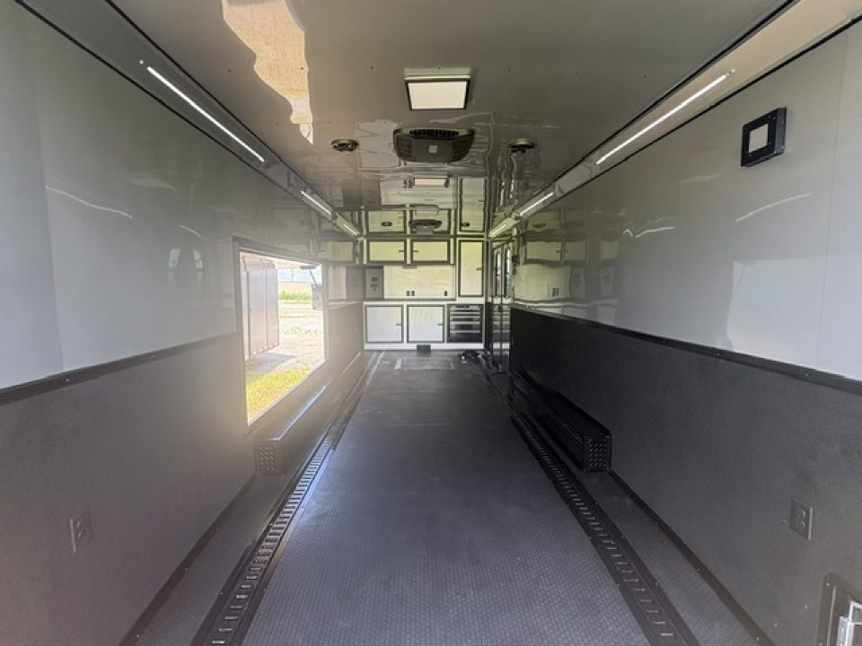 New 2027 Rock Solid Cargo Super Sport Enclosed Race Trailer For Sale Rear Spoiler Spread Axle Awning Finished Interior Cabinets A/C
