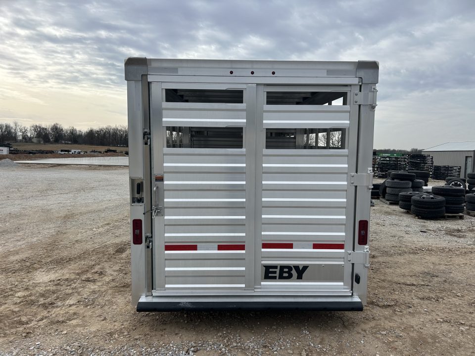 New 2027 EBY Maverick 6'11x24x6'7 Stock Trailer W/ Rolling Cut Gate