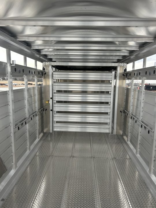 New 2027 EBY Maverick 6'11x24x6'7 Stock Trailer W/ Rolling Cut Gate