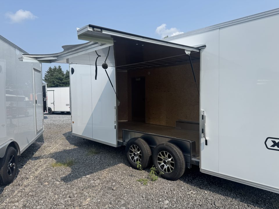 New 2027 E-Z Hauler EZEC8.5X24CH XLT PRO Car Hauler 71 SERIES, 7 FOOT 1 INCH INTERIOR HEIGHT, ELITE ESCAPE DOOR, .080 POLY SIDES, REAR CANOPY, FREE ALUMINUM WHEEL UPGRADE