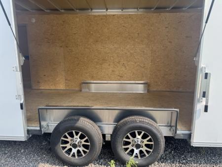 New 2027 E-Z Hauler EZEC8.5X24CH XLT PRO Car Hauler 71 SERIES, 7 FOOT 1 INCH INTERIOR HEIGHT, ELITE ESCAPE DOOR, .080 POLY SIDES, REAR CANOPY, FREE ALUMINUM WHEEL UPGRADE