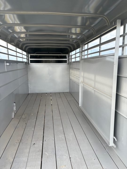 New 2026 Calico 6x16 Tandem 7K GN Stock Trailer W/ 1 Cut Gate