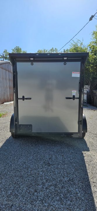 New 2026 Family Trailer 6x12 Tandem Axles Cargo / Enclosed Trailer- Screwless Exterior- Blackout Pkg- Rear Spoiler