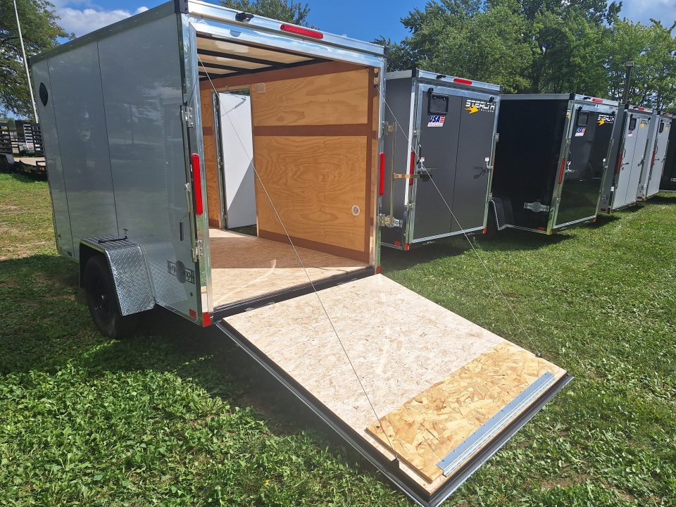 New 6x10 Single Axle Cargo / Enclosed Trailer W/ Ramp Door