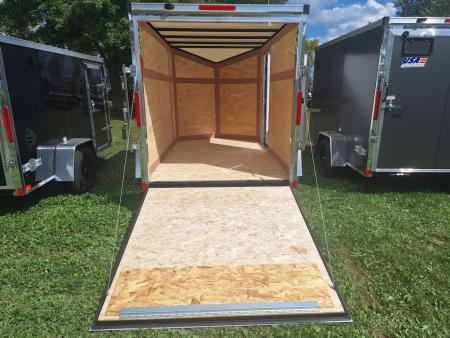 New 6x10 Single Axle Cargo / Enclosed Trailer W/ Ramp Door