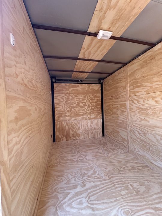 New 2026 Family Trailer 6x12 Tandem Axles Cargo / Enclosed Trailer - Screwless Exterior- Blackout Pkg- Rear Spoiler