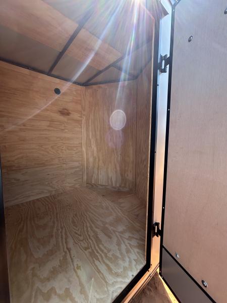 New 2026 Family Trailer 6x12 Tandem Axles Cargo / Enclosed Trailer - Screwless Exterior- Blackout Pkg- Rear Spoiler