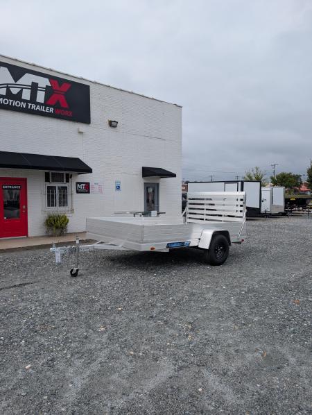 New 2026 Aluma 7810ES Solid Sides and Gate Utility Trailer