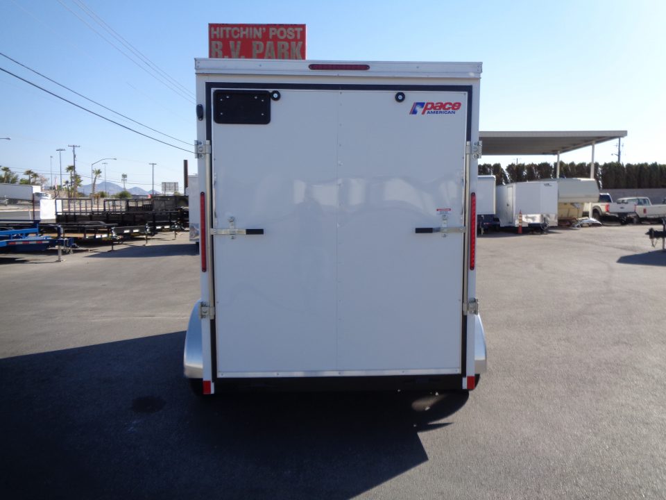 New 2027 Pace American - Out Back DLX - 6x12 V-Nose Tandem Axle 7k Cargo Trailer w/ Rear Ramp Door