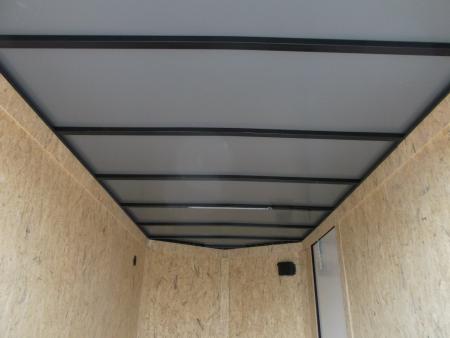 New 2027 Covered Wagon Trailers 6x10 Cargo / Enclosed Trailer / 6'6" Interior / Extra Wide Ramp / RV Side Door / LEDs / .030 Silver Semi-Screwless Exterior / Black Out Package