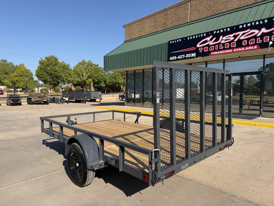 New #159188 2027 LAMAR UC 12 X 83 SINGLE AXLE PIPE TOP 3K UTILITY TRAILER W/ REAR RAMP GATE