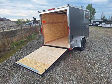 New 6x10 Single Axle Cargo / Enclosed Trailer W/ Ramp Door