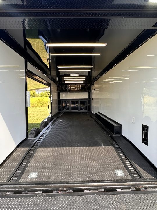 New 2027 8.5x28 Race Trailer-Finished Interior-7000LB Triple Torsion-- RECESSED E TRACK-Awning-Double Doors-GEN BOX