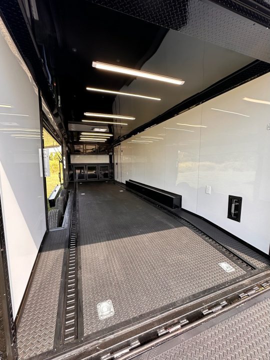 New 2027 8.5x28 Race Trailer-Finished Interior-7000LB Triple Torsion-- RECESSED E TRACK-Awning-Double Doors-GEN BOX