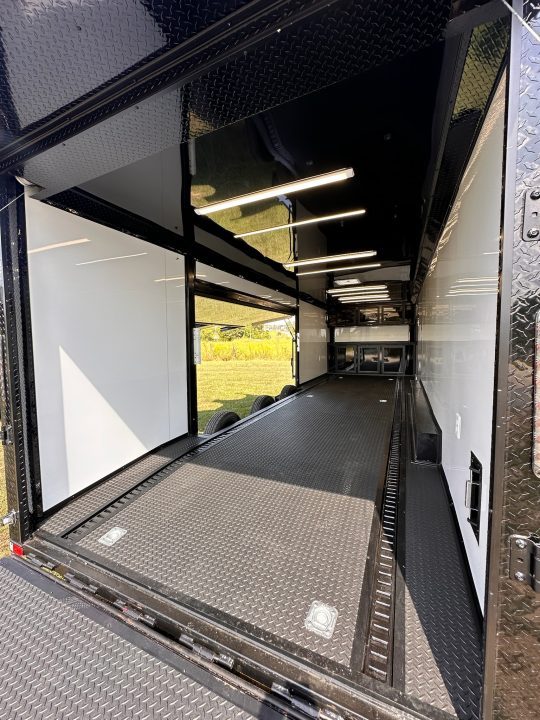 New 2027 8.5x28 Race Trailer-Finished Interior-7000LB Triple Torsion-- RECESSED E TRACK-Awning-Double Doors-GEN BOX