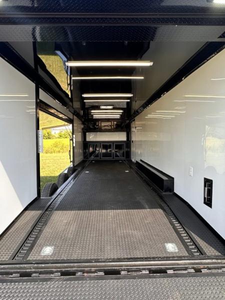 New 2027 8.5x28 Race Trailer-Finished Interior-7000LB Triple Torsion-- RECESSED E TRACK-Awning-Double Doors-GEN BOX