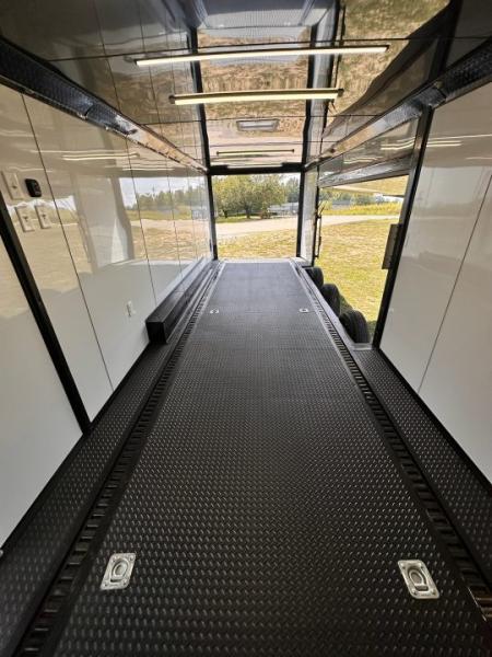 New 2027 8.5x28 Race Trailer-Finished Interior-7000LB Triple Torsion-- RECESSED E TRACK-Awning-Double Doors-GEN BOX