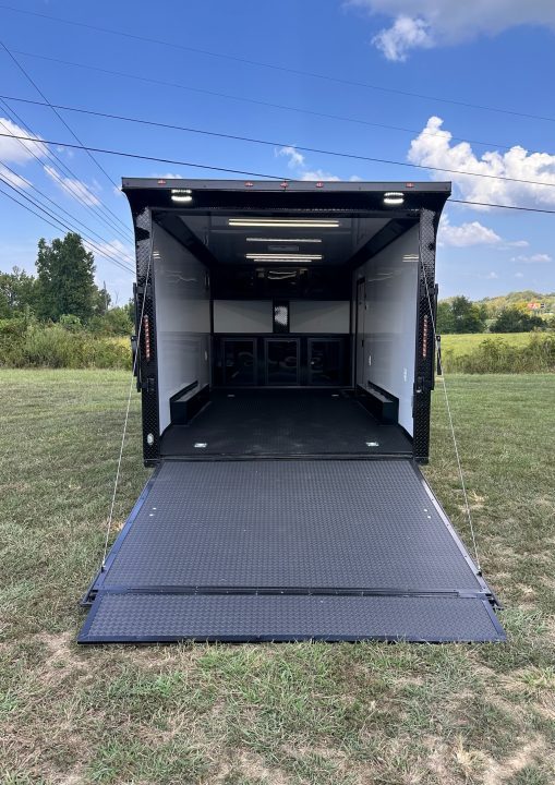 New 2027 8.5X18 Race Trailer - Finished Interior-5200LB Torsion Axle-Black Poly-Blackout