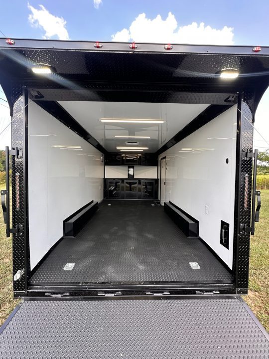 New 2027 8.5X18 Race Trailer - Finished Interior-5200LB Torsion Axle-Black Poly-Blackout