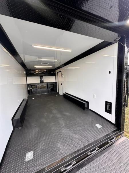New 2027 8.5X18 Race Trailer - Finished Interior-5200LB Torsion Axle-Black Poly-Blackout