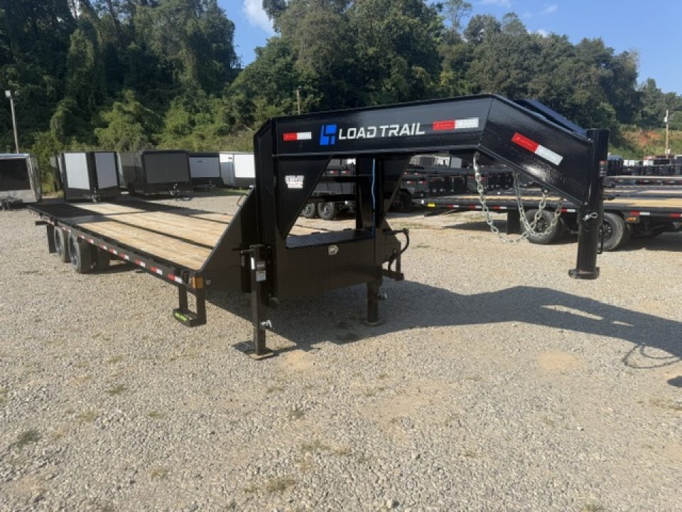 New Load Trail Gooseneck 102x32 Hydraulic Dovetail 24K Black W/ Raised Neck, Pipe Bridge, 17.5/16P & 12' Tail W/ Cleats