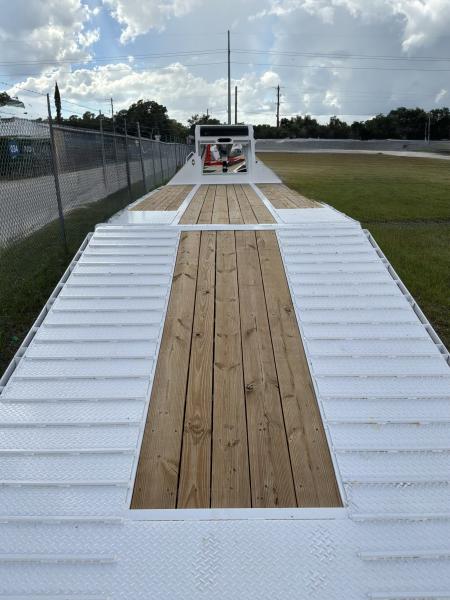 New 2027 DIAMOND C FMAX212HDT TILT TRAILER; PACESETTER 2.0 ENGINEERED BEAM WITH HYDRAULIC DOVETAIL; 32’ LONG 102” WIDE; 2 12K AXELS WITH ELECTRIC/HYDRAULIC DISC BRAKES; DUAL 20K HYDRAULIC JACKS; 7 WATT SOLAR CHARGING SYSTEM