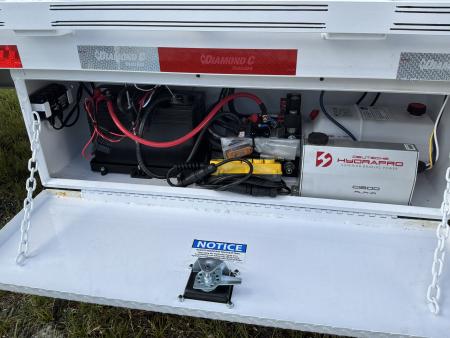 New 2027 DIAMOND C FMAX212HDT TILT TRAILER; PACESETTER 2.0 ENGINEERED BEAM WITH HYDRAULIC DOVETAIL; 32’ LONG 102” WIDE; 2 12K AXELS WITH ELECTRIC/HYDRAULIC DISC BRAKES; DUAL 20K HYDRAULIC JACKS; 7 WATT SOLAR CHARGING SYSTEM