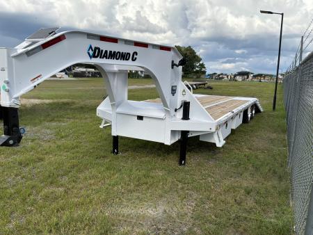 New 2027 DIAMOND C FMAX212HDT TILT TRAILER; PACESETTER 2.0 ENGINEERED BEAM WITH HYDRAULIC DOVETAIL; 32’ LONG 102” WIDE; 2 12K AXELS WITH ELECTRIC/HYDRAULIC DISC BRAKES; DUAL 20K HYDRAULIC JACKS; 7 WATT SOLAR CHARGING SYSTEM