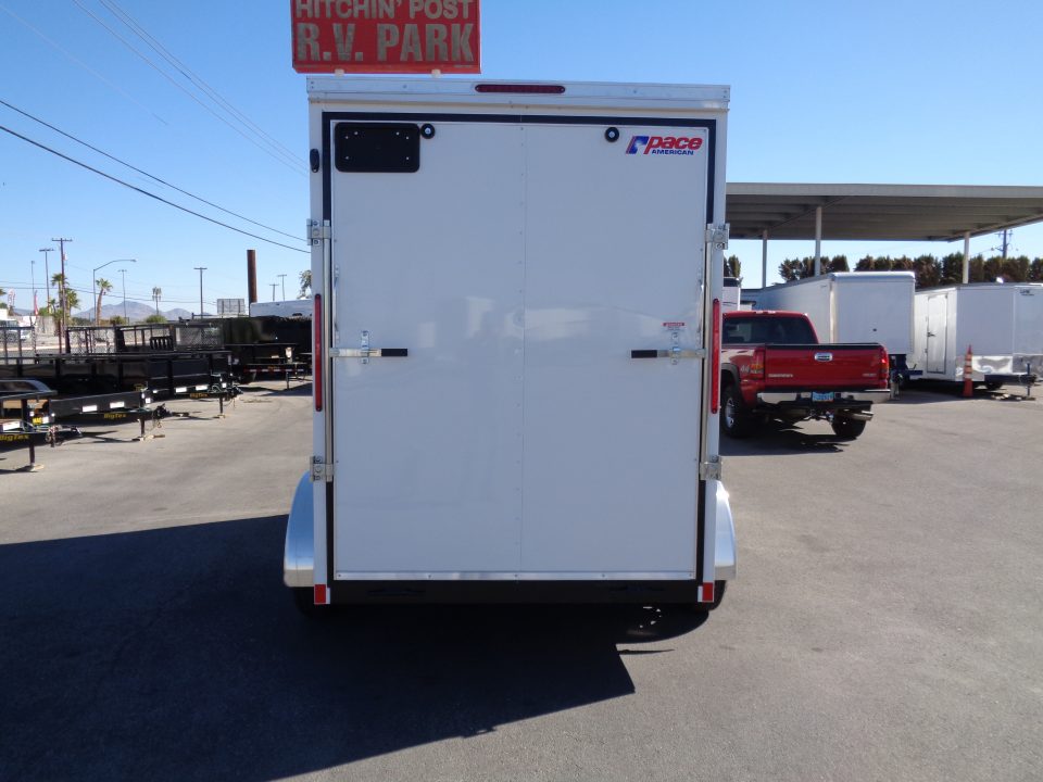 New 2027 Pace American - Out Back DLX - 6x12 V-Nose Tandem Axle 7k Cargo Trailer w/ Rear Ramp Door