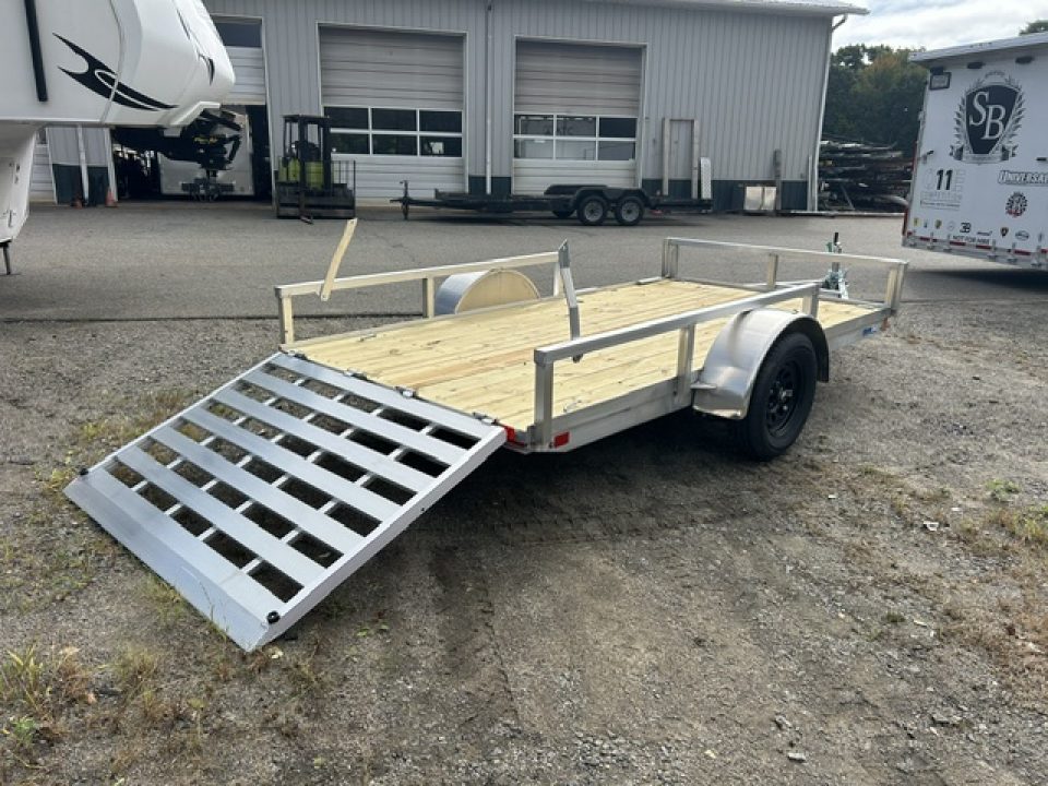 New 2027 ALCOM 6 ft. wide by 12 ft. long , single axle with lift out side ramps Utility Trailer