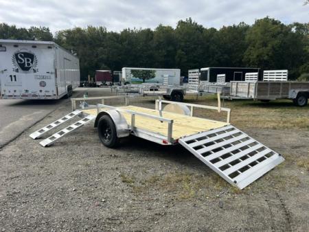 New 2027 ALCOM 6 ft. wide by 12 ft. long , single axle with lift out side ramps Utility Trailer