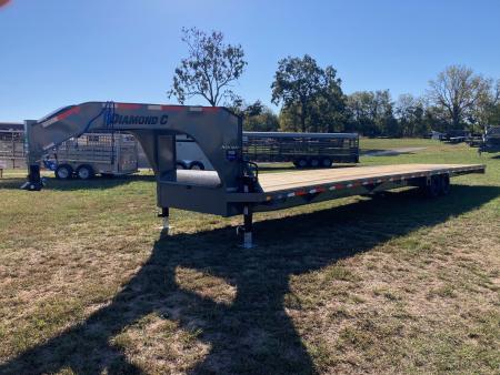 New 2027 Diamond C Trailers 102x40 TANDEM 12K GN W/ SLIDE IN RAMPS, RATCHET RAIL AND TORQUE TUBE Flatbed Trailer
